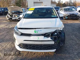 2022 Kia Rio S with VIN 3KPA25AD5NE443465, listed as a IAAI auction lot 41230852 with 20,460 mi miles and . Bid and sale history available at DreamBid. Image 6.