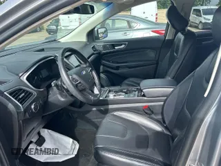 2020 Ford Edge Titanium z VIN 2FMPK3K95LBA30633, wystawiony jako IAAI lot #42473515 z przebiegiem 104 190 mil mil oraz . Historia ofert i sprzedaży dostępna na DreamBid. Obrazek 9.