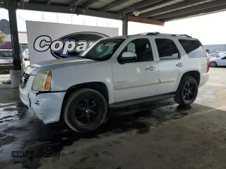 2007 GMC Yukon SLE z VIN 1GKFK13057J289505, wystawiony jako Copart lot #53389065 z przebiegiem 173 674 mil mil oraz Szkoda całkowita • Salvage title. Historia ofert i sprzedaży dostępna na DreamBid. Obrazek 1.