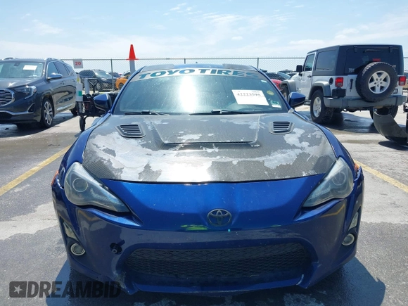 2015 Scion FR-S with VIN JF1ZNAA18F9712580, listed as a IAAI auction lot 42223595 with 157,384 mi miles and . Bid and sale history available at carsss.com. Image 6.