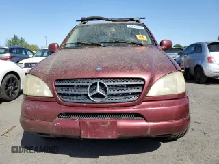 2001 Mercedes-Benz M 320/430/500 with VIN 4JGAB54E91A256176, listed as a Copart auction lot 55610525 with 215,120 mi miles and Salvage Title. Bid and sale history available at DreamBid. Image 5.