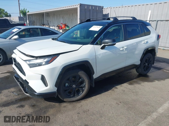 2022 Toyota RAV4 Hybrid XSE with VIN JTME6RFV9ND534822, listed as a IAAI auction lot 42477646 with 49,991 mi miles and . Bid and sale history available at DreamBid. Image 2.