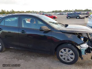 2023 Kia Rio S with VIN 3KPA24AD7PE597088, listed as a IAAI auction lot 40895934 with 1 mi miles. Bid and sale history available at carsss.com. Image 14.
