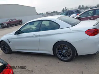 2018 BMW M4 with VIN WBS4Z9C55JED30963, listed as a IAAI auction lot 41641751 with 34,543 mi miles and . Bid and sale history available at DreamBid. Image 14.
