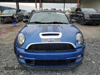 2014 MINI Coupe S z VIN WMWSX3C59ET772948, wystawiony jako Copart lot #81220834 z przebiegiem 99 211 mil mil oraz Szkody całkowita. Historia ofert i sprzedaży dostępna na DreamBid. Obrazek 5.