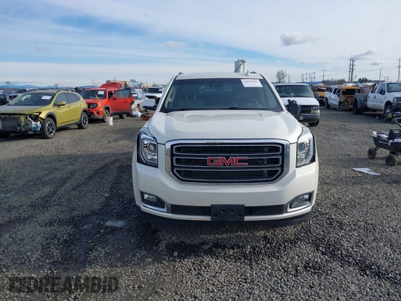 2015 GMC Yukon XL SLT with VIN 1GKS2HKC3FR586338, listed as a IAAI auction lot 41632662 with 149,133 mi miles. Bid and sale history available at carsss.com. Image 12.