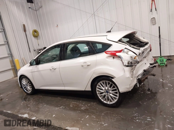 2014 Ford Focus Titanium with VIN 1FADP3N27EL110287, listed as a IAAI auction lot 42210697 with 107,741 mi miles and . Bid and sale history available at DreamBid. Image 14.