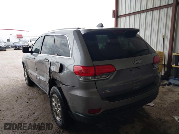 2018 Jeep Grand Cherokee Laredo E with VIN 1C4RJEAG1JC275356, listed as a IAAI auction lot 42150422 with 69,720 mi miles and . Bid and sale history available at DreamBid. Image 3.