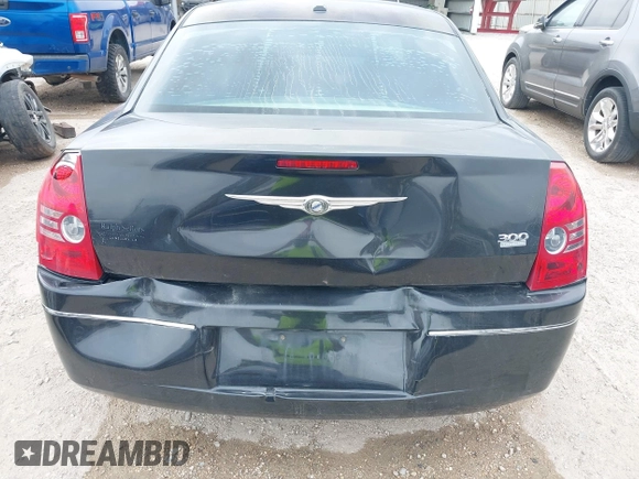 2010 Chrysler 300 Touring with VIN 2C3CA5CV0AH329717, listed as a IAAI auction lot 41785694 with 257,072 mi miles. Bid and sale history available at carsss.com. Image 6.