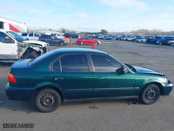 1999 Honda Civic VP with VIN 2HGEJ6617XH508270, listed as a IAAI auction lot 41319879 with 119,549 mi miles. Bid and sale history available at carsss.com. Image 13.