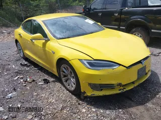 2016 Tesla Model S 70 kWh Battery with VIN 5YJSA1E14GF141579, listed as a IAAI auction lot 42209119 with 105,947 mi miles. Bid and sale history available at carsss.com. Image 1.