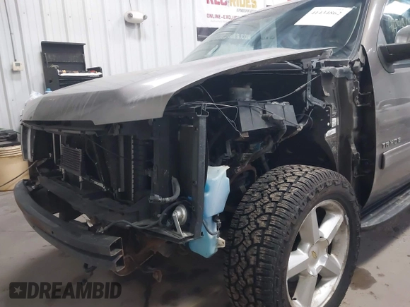 2011 Chevrolet Tahoe LT with VIN 1GNSKBE03BR268246, listed as a IAAI auction lot 41434862 with 250,991 mi miles and . Bid and sale history available at DreamBid. Image 6.