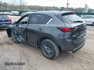 2021 Mazda CX-5 Touring with VIN JM3KFBCM8M0492145, listed as a IAAI auction lot 39077248 with 20,408 mi miles. Bid and sale history available at carsss.com. Image 3.