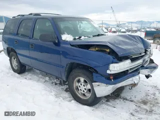 2002 Chevrolet Tahoe LS with VIN 1GNEK13V12J330179, listed as a IAAI auction lot 41382530 with 216,051 mi miles. Bid and sale history available at carsss.com. Image 1.