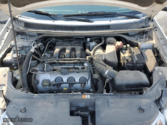2009 Ford Taurus X SEL with VIN 1FMDK02W69GA04132, listed as a Copart auction lot 77351264 with 87,769 mi miles and Salvage Title. Bid and sale history available at carsss.com. Image 12.