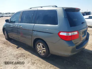 2007 Honda Odyssey EX-L with VIN 5FNRL38767B452922, listed as a IAAI auction lot 41917482 with 282,542 mi miles and . Bid and sale history available at DreamBid. Image 3.