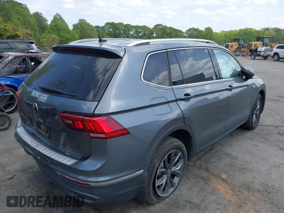 2022 Volkswagen Tiguan SE with VIN 3VV3B7AX9NM089164, listed as a IAAI auction lot 42065583 with 59,270 mi miles and . Bid and sale history available at DreamBid. Image 4.