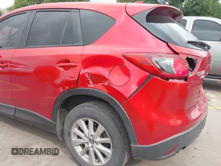 2015 Mazda CX-5 Touring with VIN JM3KE4CYXF0439953, listed as a IAAI auction lot 42124197 with 242,614 mi miles and . Bid and sale history available at DreamBid. Image 17.