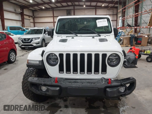 2021 Jeep Wrangler Unlimited Rubicon with VIN 1C4HJXFN2MW809904, listed as a IAAI auction lot 41567956 with 34,000 mi miles and . Bid and sale history available at DreamBid. Image 12.