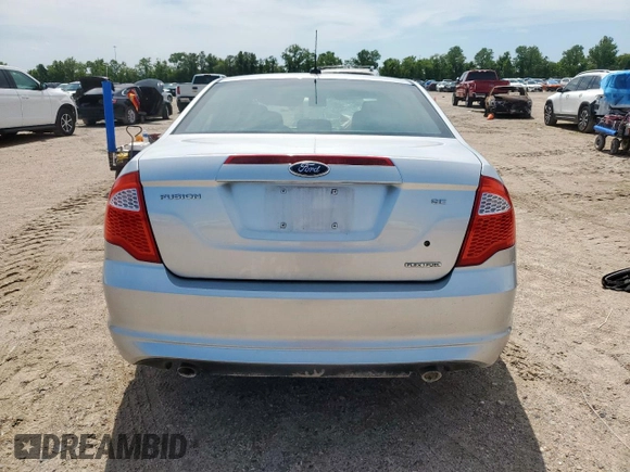 2012 Ford Fusion SE z VIN 3FAHP0HG8CR145183, wystawiony jako Copart lot #58627705 z przebiegiem 236 148 mil mil oraz Szkoda całkowita • Salvage title. Historia ofert i sprzedaży dostępna na DreamBid. Obrazek 6.