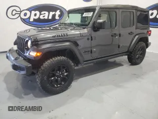 2021 Jeep Wrangler Unlimited Willys Sport with VIN 1C4HJXDN1MW679696, listed as a Copart auction lot 55693923 with 164,749 mi miles and Salvage Title. Bid and sale history available at DreamBid. Image 1.