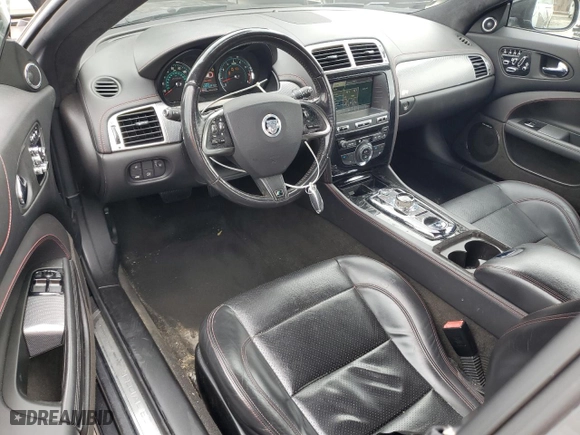 2013 Jaguar XK with VIN SAJWA4DC6DMB50779, listed as a Copart auction lot 50687705 with 106,826 mi miles and Clean Title. Bid and sale history available at carsss.com. Image 8.
