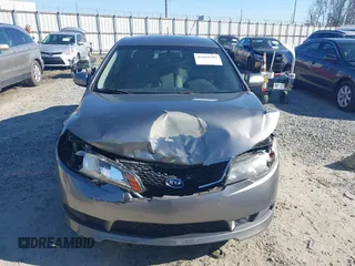2012 Kia Forte EX with VIN KNAFU4A24C5560114, listed as a IAAI auction lot 41669309 with 236,464 mi miles. Bid and sale history available at carsss.com. Image 12.