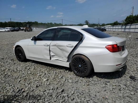2015 BMW 3 Series 328i xDrive with VIN WBA3B3G52FNT19323, listed as a Copart auction lot 61873015 with 110,893 mi miles and Salvage title. Bid and sale history available at DreamBid. Image 2.