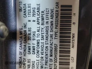 2013 Honda Civic LX z VIN 2HGFB2F50DH559957, wystawiony jako Copart lot #59290165 z przebiegiem 148 553 mil mil oraz Szkoda całkowita • Salvage title. Historia ofert i sprzedaży dostępna na DreamBid. Obrazek 12.