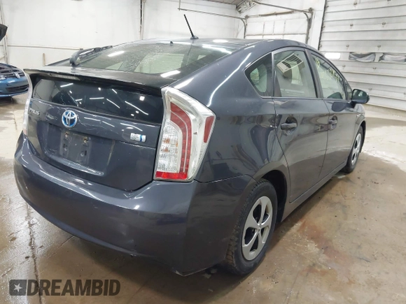 2015 Toyota Prius Four with VIN JTDKN3DU9F0479021, listed as a IAAI auction lot 42632754 with 77,400 mi miles and . Bid and sale history available at DreamBid. Image 4.
