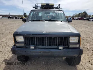 1993 Jeep Cherokee SE with VIN 1J4FJ28S0PL594889, listed as a Copart auction lot 50103425 with 174,333 mi miles and Salvage Title. Bid and sale history available at carsss.com. Image 5.