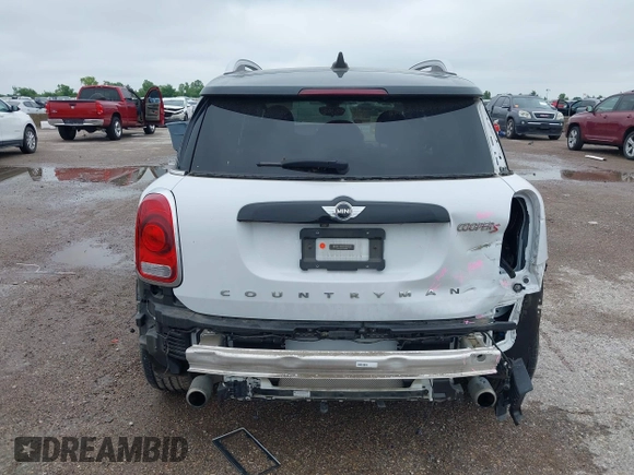 2018 MINI Countryman Cooper S z VIN WMZYT3C31J3D99568, wystawiony jako IAAI lot #42131017 z przebiegiem 54 992 mil mil oraz . Historia ofert i sprzedaży dostępna na DreamBid. Obrazek 16.
