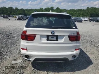 2013 BMW X5 xDrive35i z VIN 5UXZV4C52D0G56473, wystawiony jako Copart lot #56563345 z przebiegiem 156 884 mil mil oraz Szkoda całkowita • Salvage title. Historia ofert i sprzedaży dostępna na DreamBid. Obrazek 6.