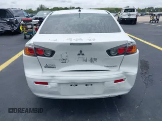 2016 Mitsubishi Lancer ES z VIN JA32U2FU7GU000923, wystawiony jako IAAI lot #42238951 z przebiegiem 134 955 mil mil oraz . Historia ofert i sprzedaży dostępna na DreamBid. Obrazek 16.