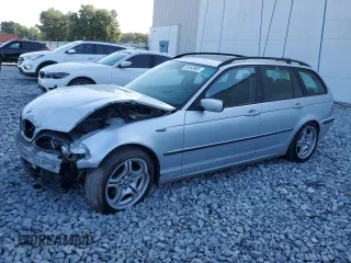 2002 BMW 3 Series 325xi with VIN WBAEP33492PE91003, listed as a Copart auction lot 54543865 with 318,746 mi miles and Salvage title. Bid and sale history available at DreamBid. Image 1.