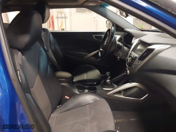 2014 Hyundai Veloster with VIN KMHTC6AD4EU196870, listed as a IAAI auction lot 41207663 with 119,252 mi miles. Bid and sale history available at carsss.com. Image 5.
