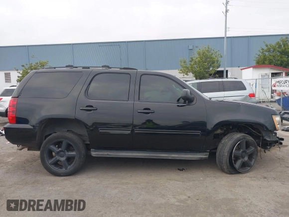 2013 Chevrolet Tahoe LT with VIN 1GNSKBE05DR152825, listed as a IAAI auction lot 41450863 with 157,305 mi miles and . Bid and sale history available at DreamBid. Image 14.