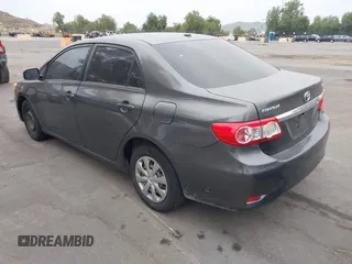 2011 Toyota Corolla L with VIN JTDBU4EE7BJ106810, listed as a IAAI auction lot 42054750 with 256,064 mi miles. Bid and sale history available at carsss.com. Image 3.