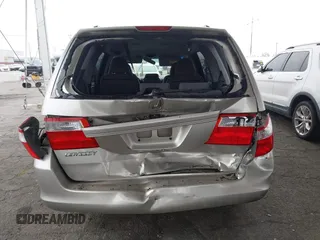 2007 Honda Odyssey EX with VIN 5FNRL38477B432832, listed as a IAAI auction lot 42153673 with 133,652 mi miles and . Bid and sale history available at DreamBid. Image 6.