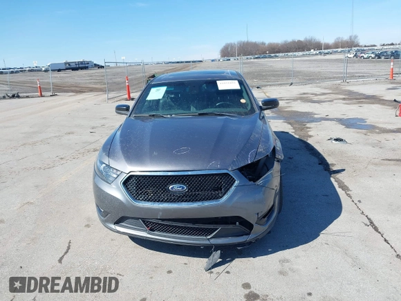 2013 Ford Taurus SHO с VIN 1FAHP2KT0DG220825, выставлен на аукционе IAAI как лот 41851095 с пробегом 163 797 миль миль и . История ставок и продаж доступна на DreamBid. Изображение 6.