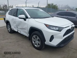 2022 Toyota RAV4 LE with VIN 2T3K1RFV1NC205621, listed as a IAAI auction lot 42576870 with 30,465 mi miles and . Bid and sale history available at DreamBid. Image 1.