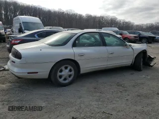 1999 Oldsmobile Aurora with VIN 1G3GR62C4X4112642, listed as a Copart auction lot 48176035 with 100,342 mi miles and Salvage Title. Bid and sale history available at DreamBid. Image 3.