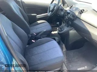 2011 Mazda 2 Sport with VIN JM1DE1HY7B0116561, listed as a IAAI auction lot 42006952 with 139,369 mi miles. Bid and sale history available at carsss.com. Image 5.