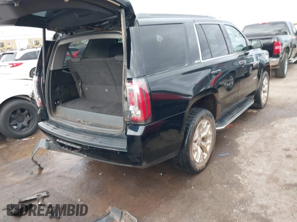 2017 GMC Yukon SLE with VIN 1GKS2AKC0HR136012, listed as a IAAI auction lot 41707322 with 81,821 mi miles. Bid and sale history available at carsss.com. Image 4.