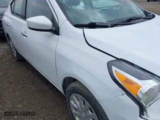 2019 Nissan Versa Sedan SV with VIN 3N1CN7AP1KL881058, listed as a IAAI auction lot 42032907 with 106,842 mi miles. Bid and sale history available at carsss.com. Image 12.