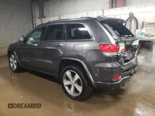 2015 Jeep Grand Cherokee Overland with VIN 1C4RJFCT2FC613502, listed as a Copart auction lot 89207005 with 124,482 mi miles and Salvage Title. Bid and sale history available at carsss.com. Image 2.