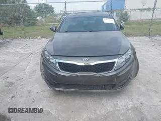 2011 Kia Optima LX with VIN KNAGM4A70B5162915, listed as a IAAI auction lot 42094325 with 156,169 mi miles and . Bid and sale history available at carsss.com. Image 6.