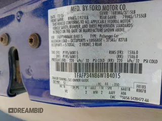 2006 Ford Focus S with VIN 1FAFP34N86W184015, listed as a IAAI auction lot 41832666 with 75,967 mi miles and . Bid and sale history available at carsss.com. Image 9.