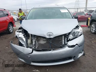 2013 Toyota Sienna XLE with VIN 5TDDK3DC7DS056599, listed as a IAAI auction lot 41736510 with 120,230 mi miles and . Bid and sale history available at DreamBid. Image 12.