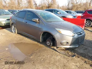 2014 Ford Focus SE with VIN 1FADP3F29EL392642, listed as a IAAI auction lot 41496380 with 101,606 mi miles. Bid and sale history available at carsss.com. Image 1.